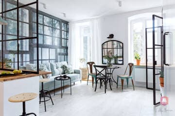 Salon z jadalnią pełen światła - oryginalne mieszkanie przy parku w Łodzi