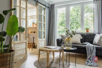 Przytulny salon mieszkania Urban Zen w Łodzi