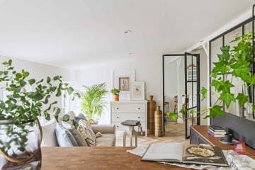 Przytulny salon mieszkania Urban Farmhouse w Łodzi