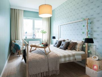 Sypialnia pełna życia i kolorów w mieszkaniu w stylu Toskańskim w Łodzi