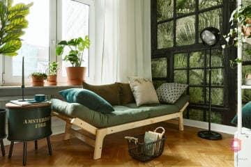 Tropikalny salon mieszkania Green Loft na sprzedaż w Łodzi Salon z zielonymi kolorami w mieszkaniu Green Loft w Łodzi